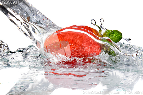 Image of Fresh strawberry and water splash isolated on white