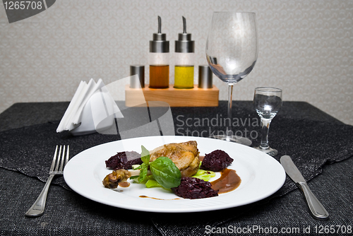 Image of fried chicken on plate and served table