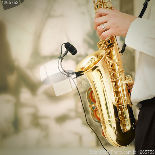 Image of playing on sax