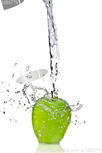 Image of fresh water splash on green apple isolated on white