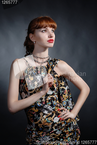 Image of Atrractive girl posing in studio