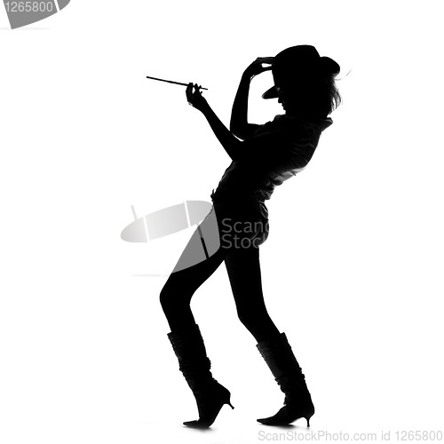 Image of silhouette of smoking girl with hat
