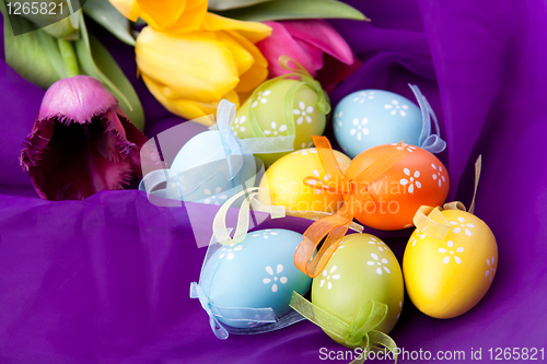 Image of color easter eggs with tulips 