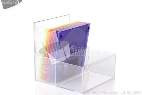 Image of Color floppy disks in box isolated on white
