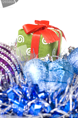 Image of christmas balls with and gift with decoration isolated on white