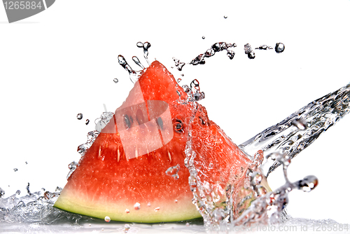 Image of watermelon and water splash isolated on white