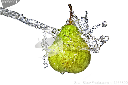 Image of fresh water splash on green pear isolated on white