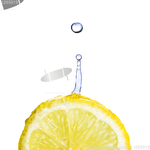 Image of fresh water drop on lemon isolated on white