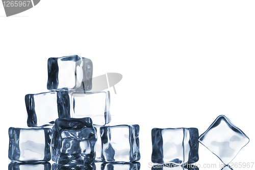 Image of ice cubes with water drops isolated on white