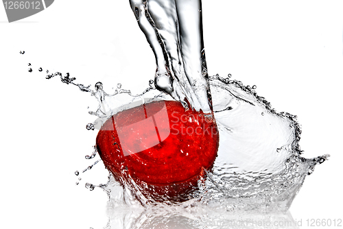 Image of red beet with water splash isolated on white