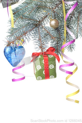 Image of Christmas ball, gift and decoration on fir tree branch isolated 