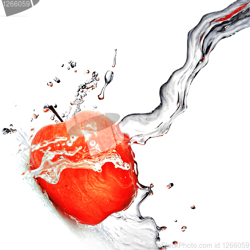 Image of fresh water splash on red apple isolated on white