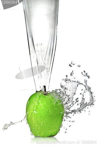Image of fresh water splash on green apple isolated on white
