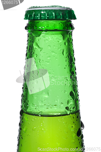 Image of Green beer bottle with water drops isolated on white