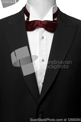 Image of black suite with white shirt and red butterfly