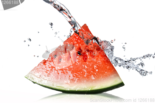Image of watermelon and water splash isolated on white