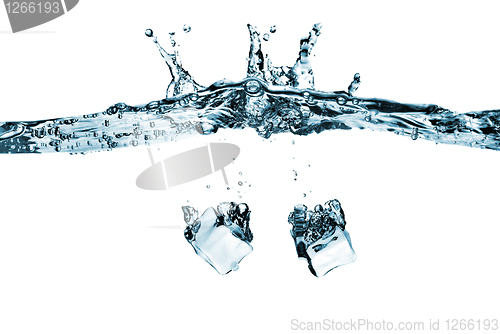 Image of ice cubes dropped into water with splash isolated on white