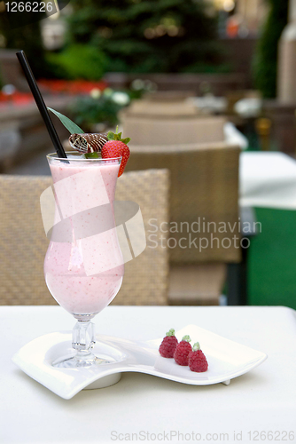 Image of strawberry milkshake on the table