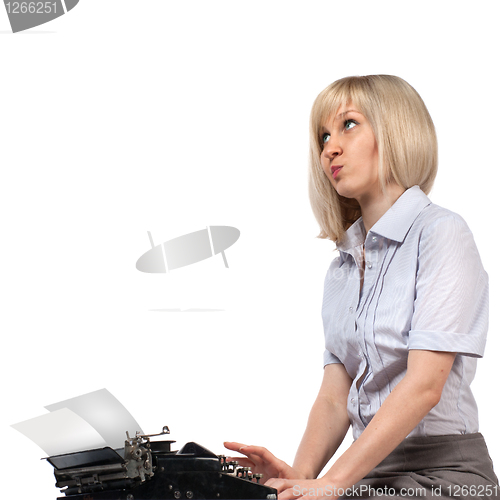 Image of Business woman with vintage typing machine on white