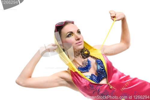 Image of Beautiful young woman in color wear on white