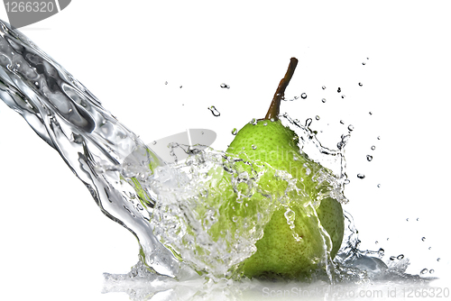 Image of fresh water splash on green pear isolated on white
