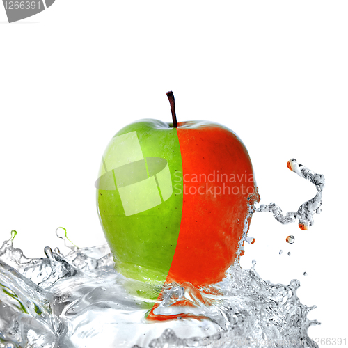 Image of fresh water splash on red and green apple isolated on white