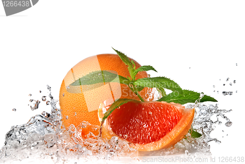 Image of Water splash on grapefruit with mint isolated on white