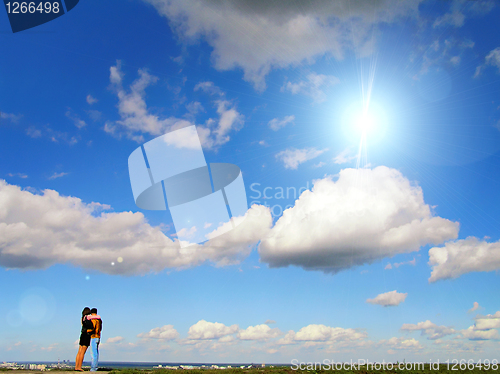 Image of couple against blue sky