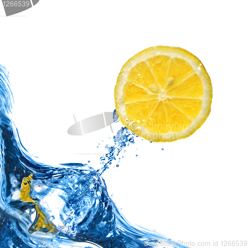 Image of Fresh lemon fly out from blue water isolated on white