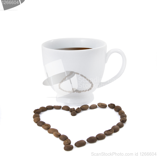 Image of Coffee cup with heart from coffee beans isolated on white