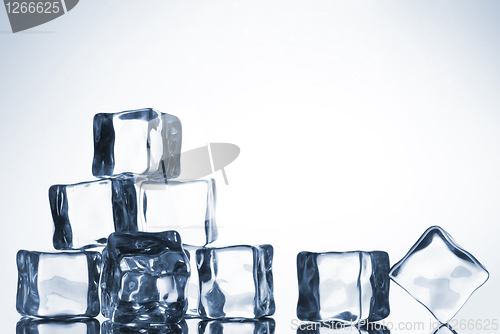 Image of ice cube with water drops