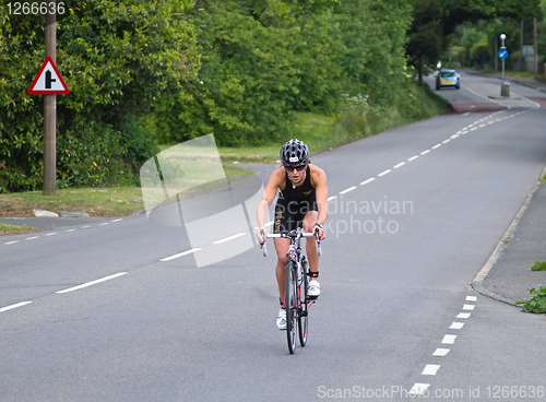 Image of Woman Triathlete Cycling