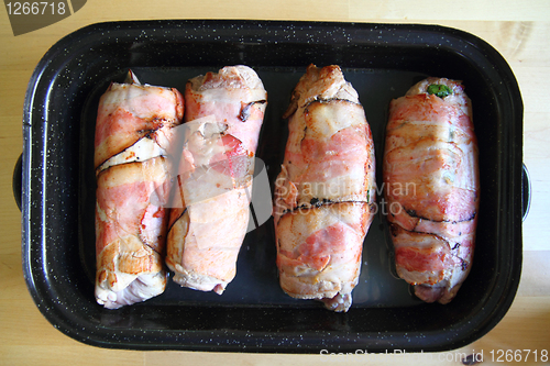 Image of baked meat rolls from the pig 