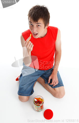 Image of Child eating snakes confectionery