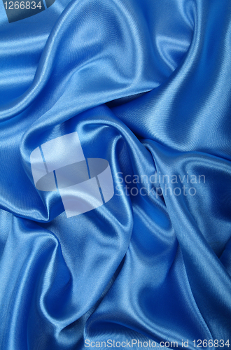 Image of Smooth elegant blue silk as background 