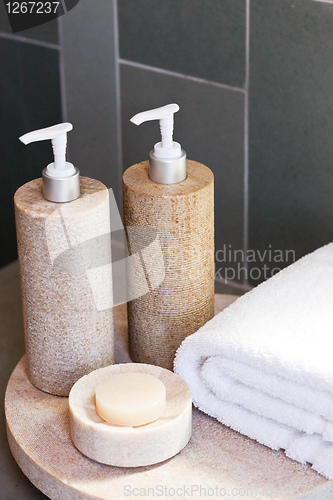 Image of dispensers, soap and towel