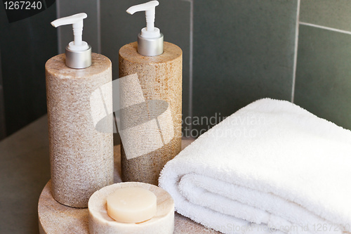 Image of dispensers, soap and towel