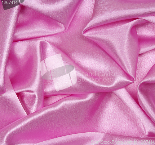 Image of Smooth elegant pink silk as background 