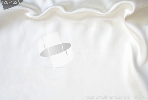 Image of Smooth elegant white silk as background 
