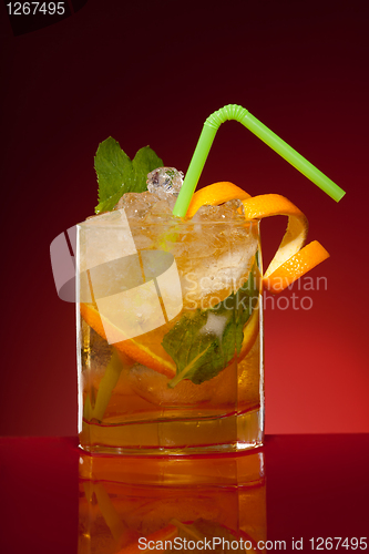 Image of Glass of orange cocktail