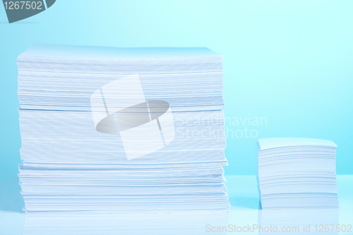 Image of Big and small paper piles