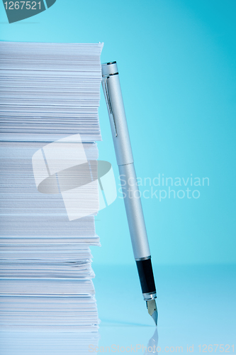 Image of Fountain pen and stack of paper