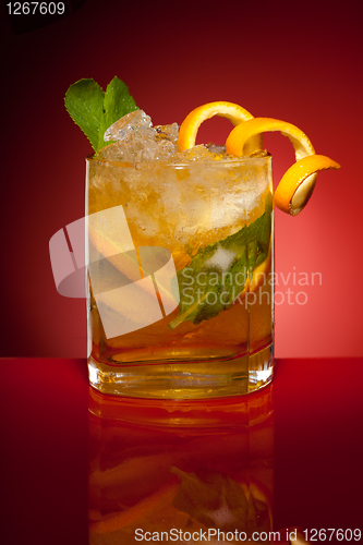 Image of Orange drink with ice and mint