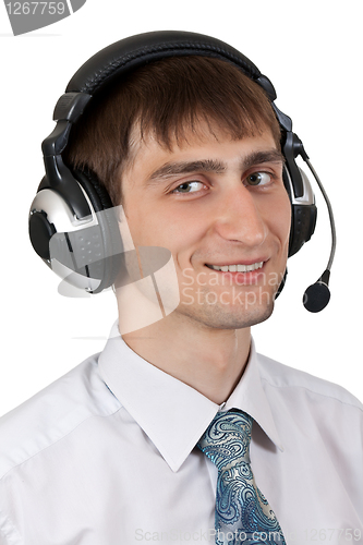 Image of businessman in shirt and tie in the headphones