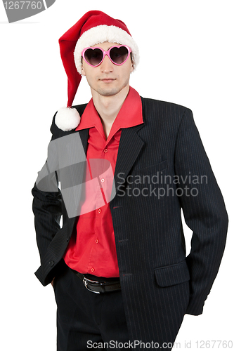 Image of businessman in the Santa hat and sunglasses