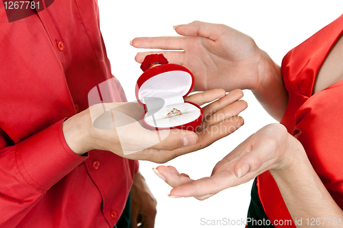 Image of man's hand gives a box