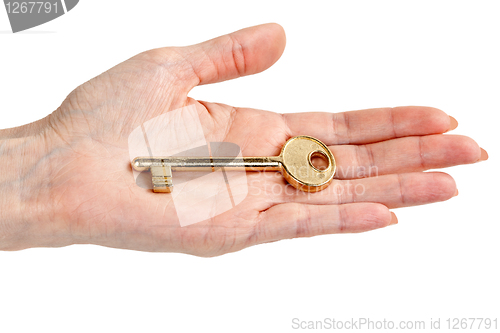 Image of woman's hand with a key,