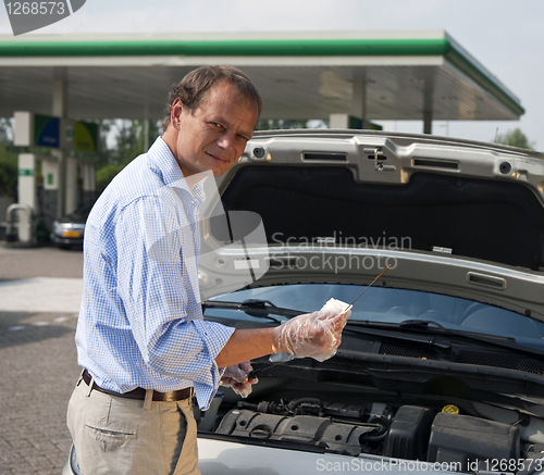 Image of Checking oil levels