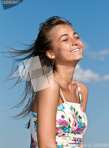 Image of beautiful young girl smiling