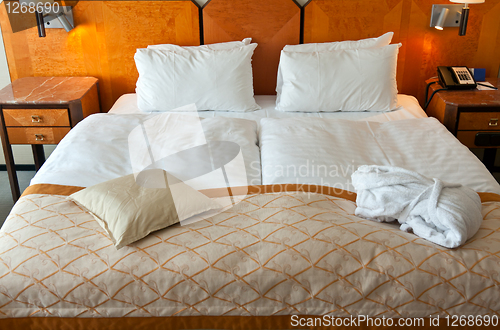 Image of bed in a hotel room